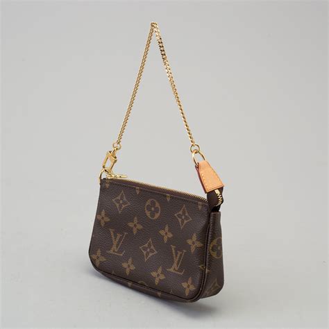 small louis vuitton logo|louis vuitton small tote.